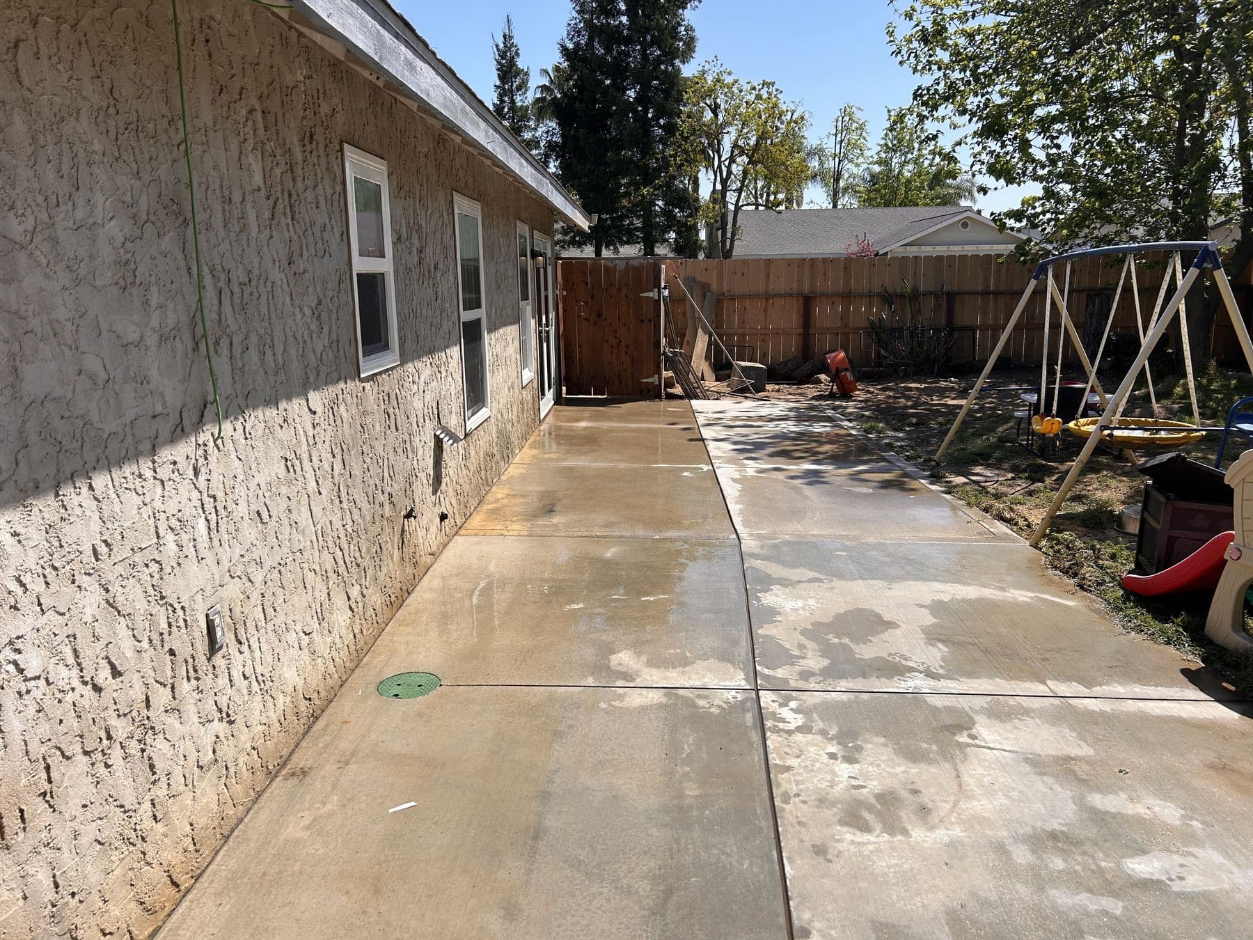 Concrete side yard after pressure washing